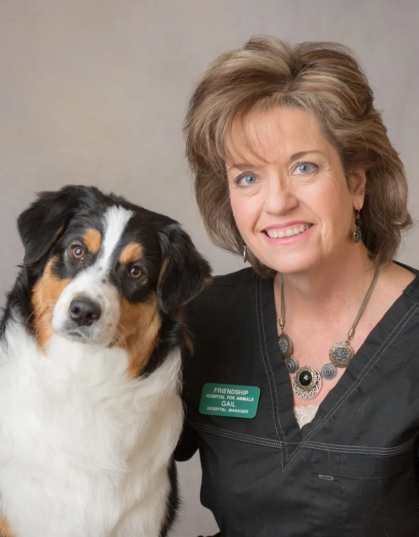 Gail Thompson with brown, white, and black dog